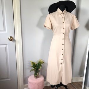 Long tan jacket dress. Button all the way down